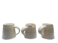 three white ceramic mugs on a black background