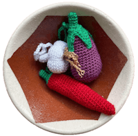 crocheted vegetables in a bowl