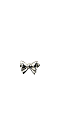 a silver bow ring on a black background