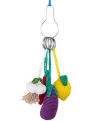 a crocheted fruit and vegetable toy hanging from a chain